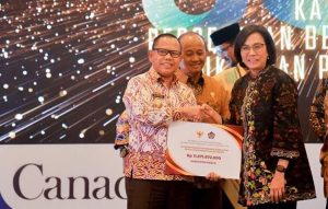 Dinilai Berhasil, Pemkab Mesuji Terima Penghargaan Kinerja Fiskal Daerah Dari Dua Menteri