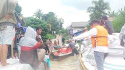 Pemkab Mesuji Salurkan Bantuan Dari Kemensos Untuk Korban Banjir Rob