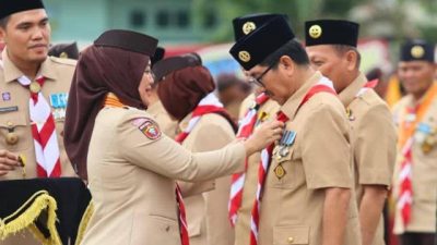 Bupati Lampura Gondol Penghargaan Pramuka di Apel Besar ke-64